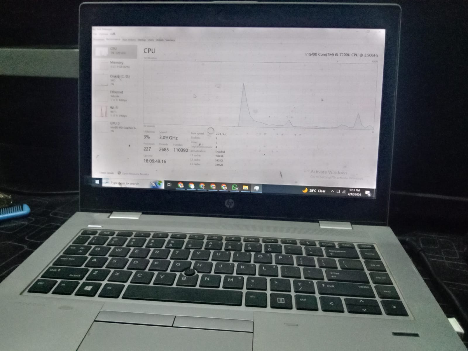 HP ProBook 640 G4 laptop with black safety cover showing Windows 10 Pro 22H2 desktop in a developer office