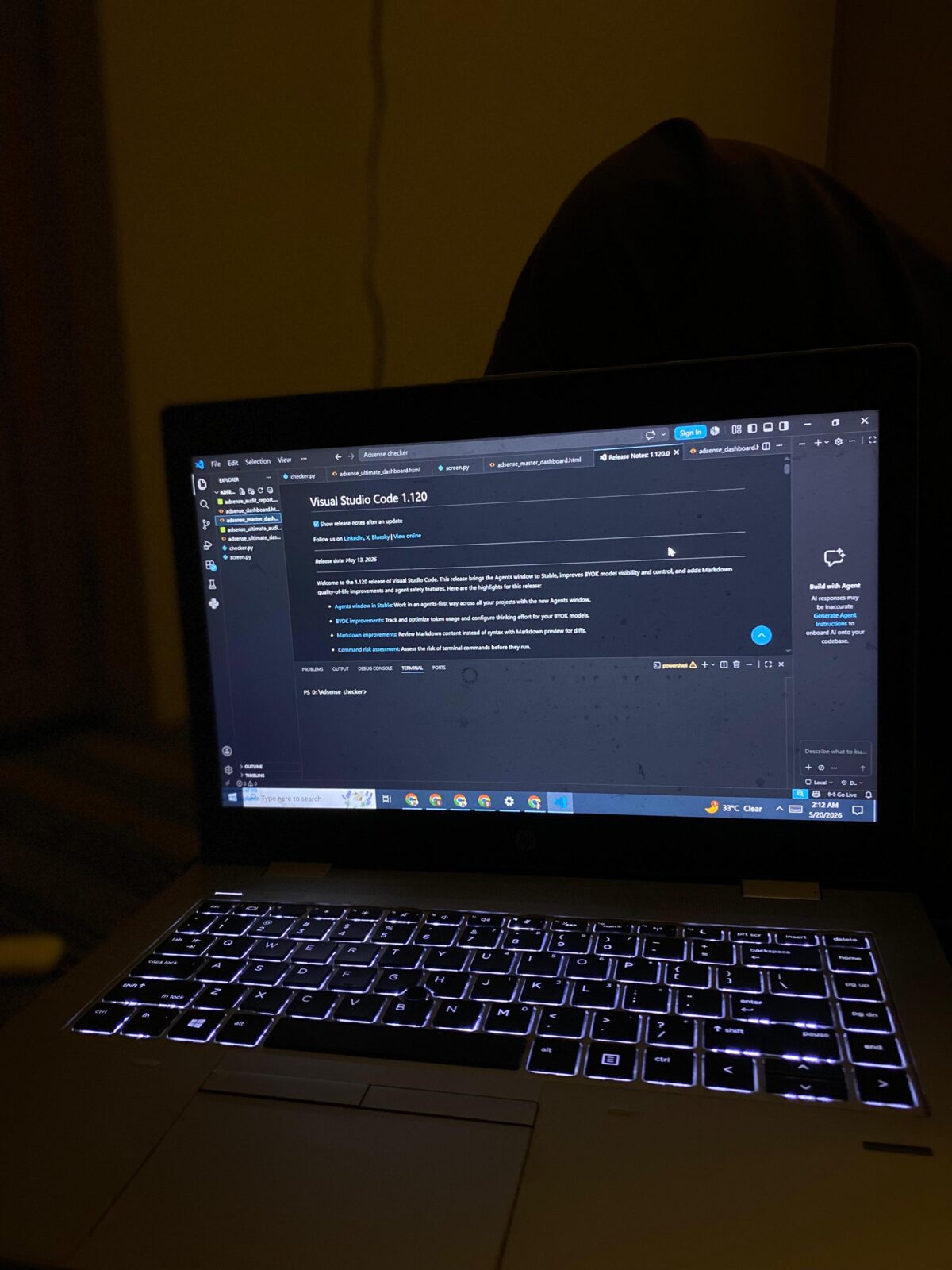 HP ProBook 640 G4 on a desk showing Visual Studio Code and multiple browser tabs open under active developer deployment.