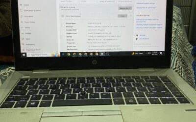 HP ProBook 640 G4 resting alongside its bundled stock charger, laptop transit case, and pre-applied screen protector layer