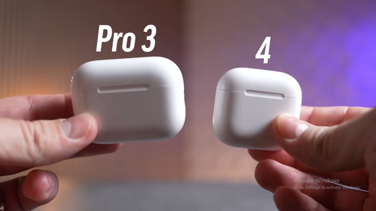 Side-by-side comparison of AirPods Pro 3 and AirPods 4 in their cases